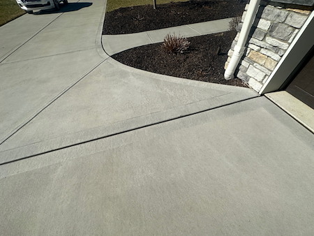 Can a sunken driveway be lifted without replacing it